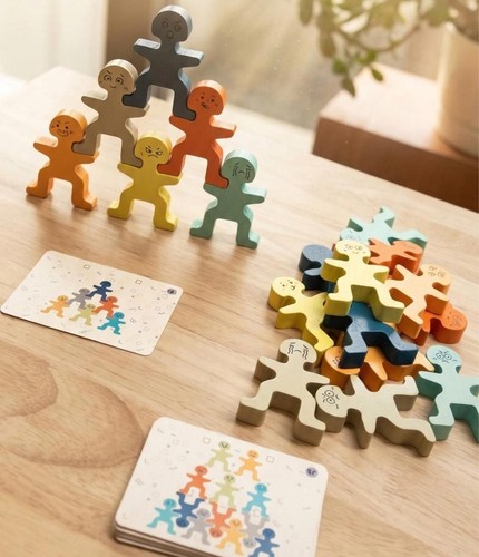 Wooden people stacking blocks - people,